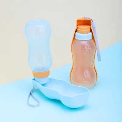 Foto do anúncio: Garrafa Bebedouro Pet 400 ml plástico portátil acompanha alça de nylon para transporte